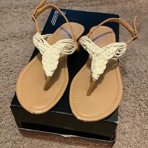 Woman’s tan sandals